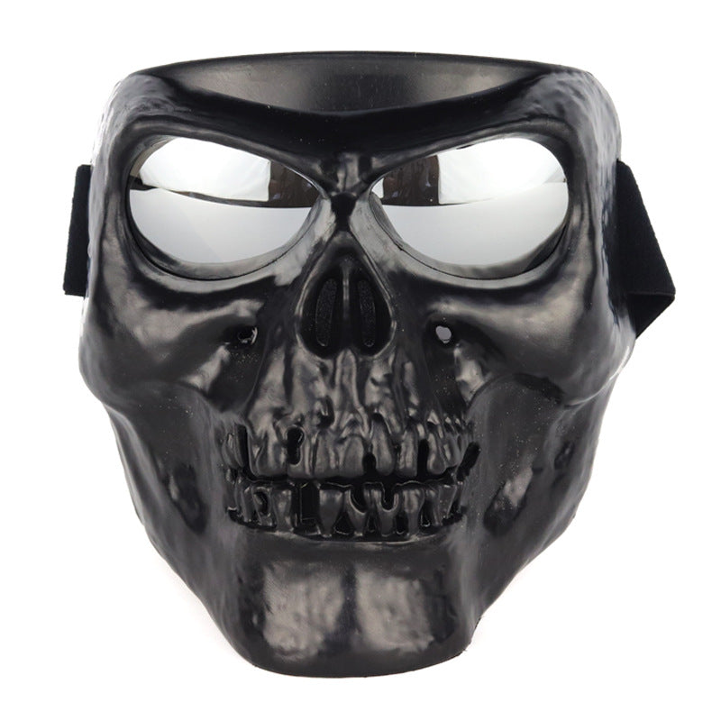 Skull mask motorcycle rider equipped with goggles